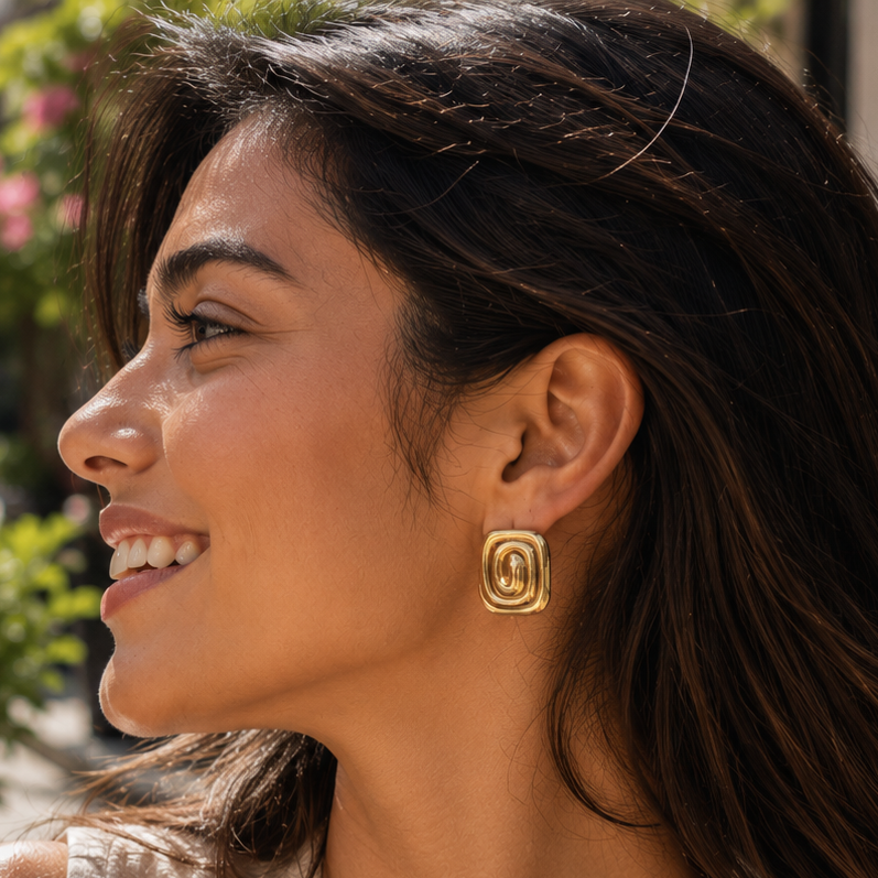 Gold swirl studs