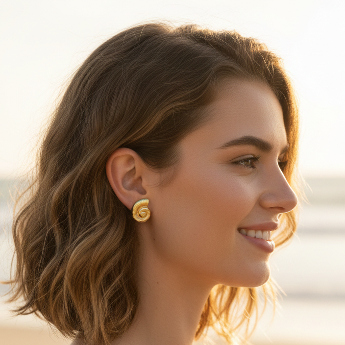 Gold Nautilus Shell Studs – Wide Beach Model Shot Small Earrings