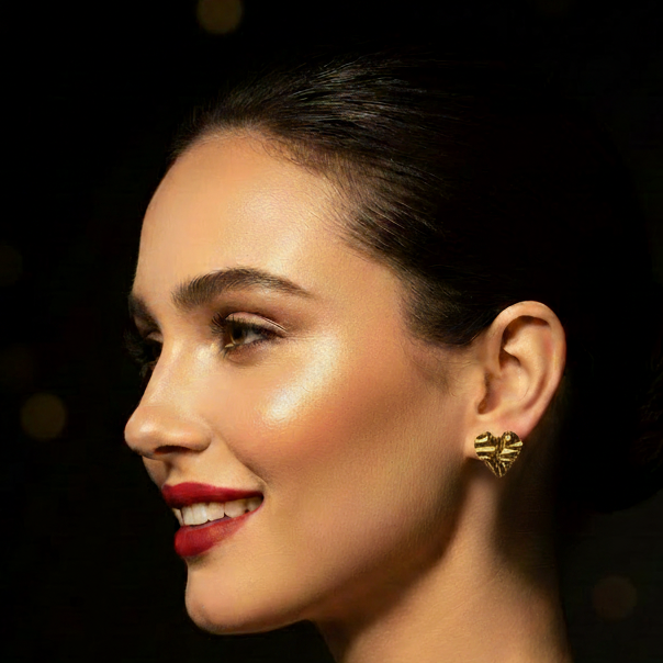 Hammered Gold Heart Studs – Glamorous Model Shot Medium