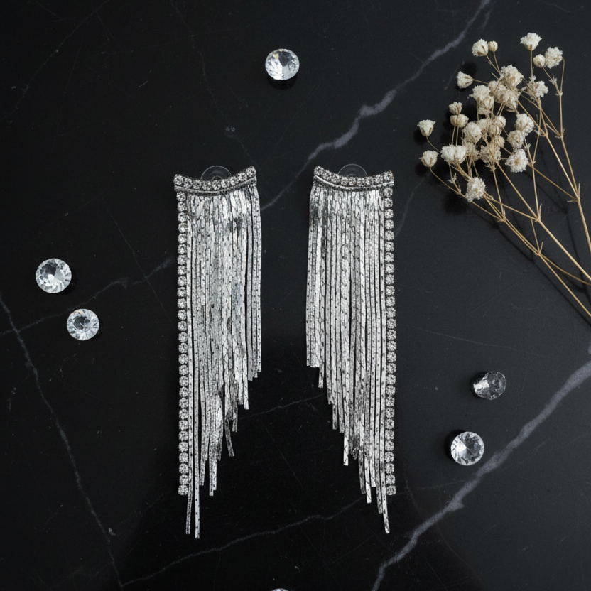Silver Tassel Earrings – Black Marble Flatlay